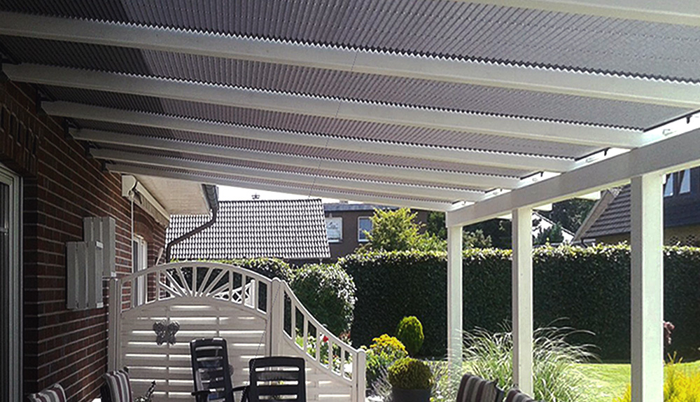 Sonnenschutz für Terrassenüberdachung nach Maß